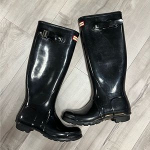 Black tall hunter rain boots